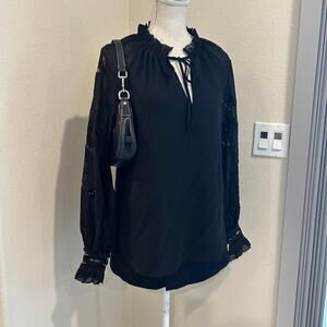 Ralph Lauren blouse with sheer embroidered sleeves. Size small petite.